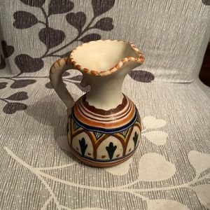 Toledo signed pottery. 5 inch pitcher. No chips